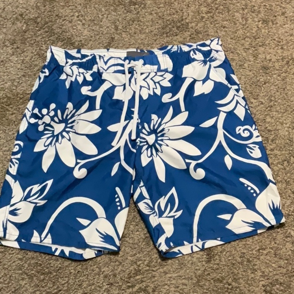Old Navy blue & white floral swimming trunks. Size XL (40-42)